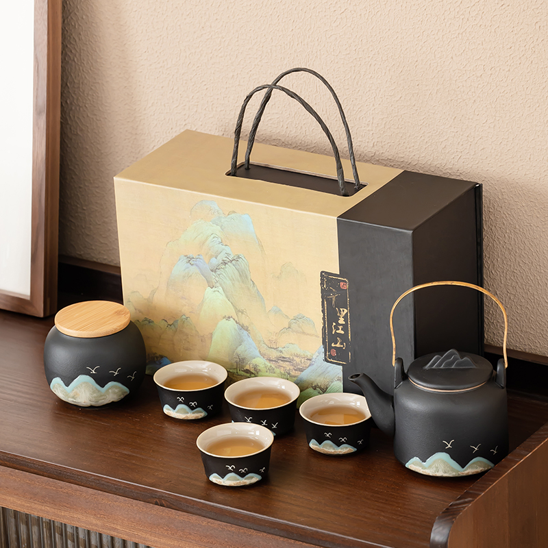 Stoneware Mountain Painting Handle-Lifted Pot Tea Set An Upscale Tea Set Consisting Of One Teapot, Four Cups, And A Tea Storage Container